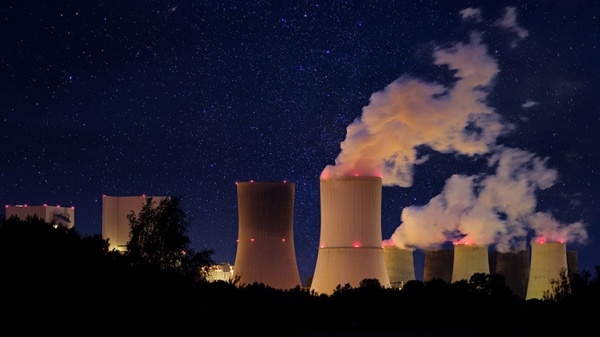 A nuclear power plant operating at night