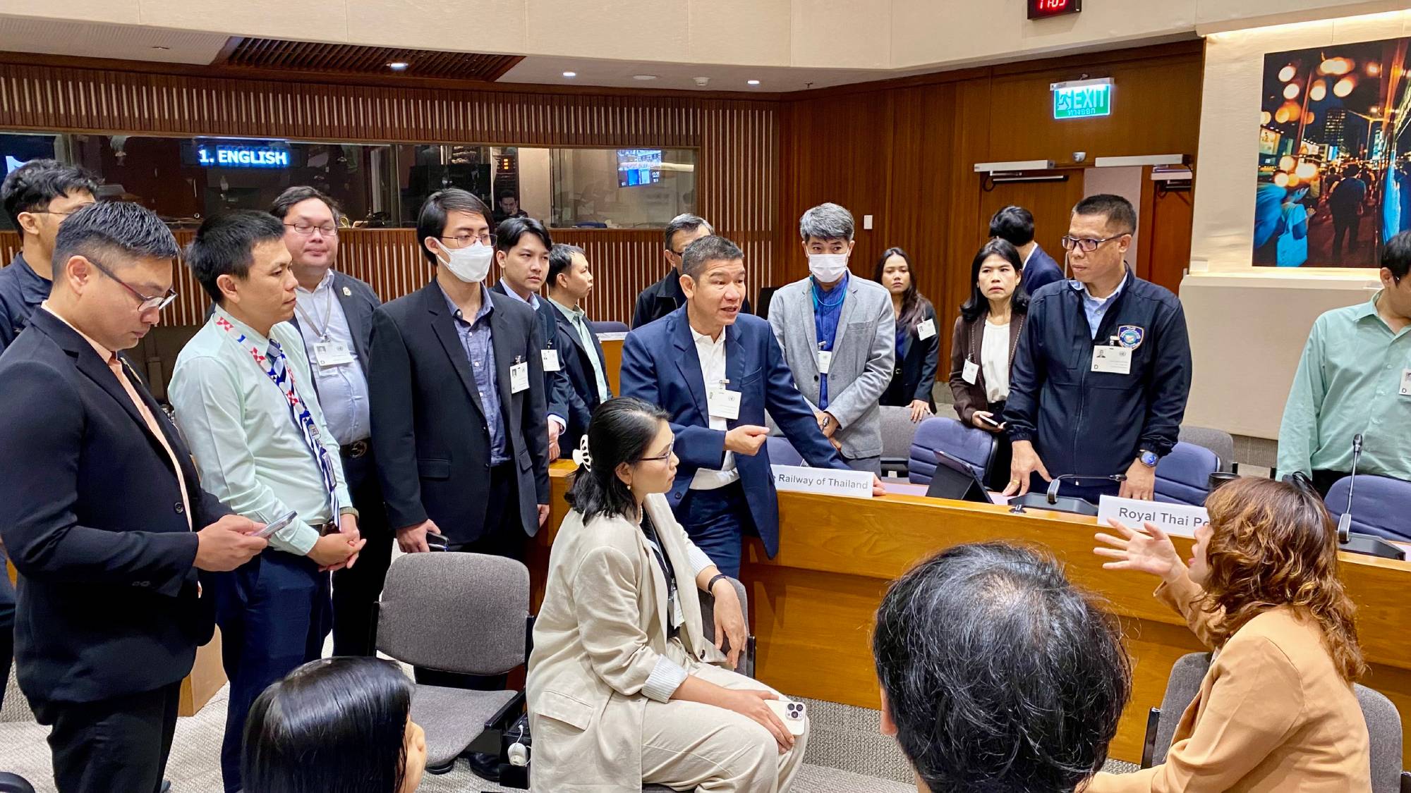 Participants from Thai institutions, including the State Railway of Thailand and the Royal Thai Police, discuss a scenario during a UNIDIR cyber tabletop exercise.